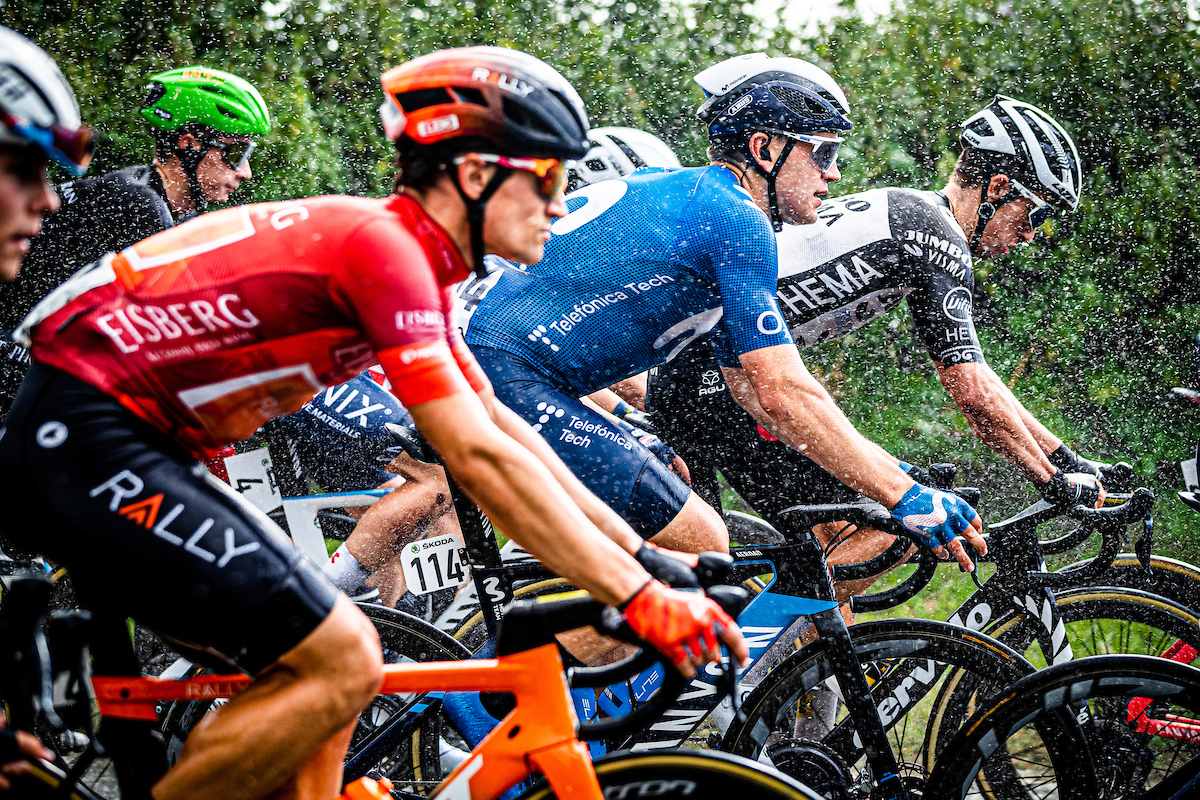 A group of cyclists cycling from left to right with hedges behind them. Picture by Alex Whitehead/SWpix.com - Cycling - 09/09/2021 - AJ Bell Tour of Britain - Stage 5: Alderley Park to Warrington - Gabriel Cullaigh of Movistar.